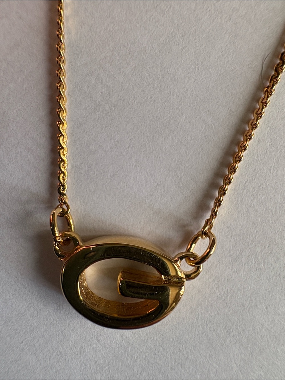 Givenchy G gold plated Pendant Necklace . Chain needs to be re mended easy fix